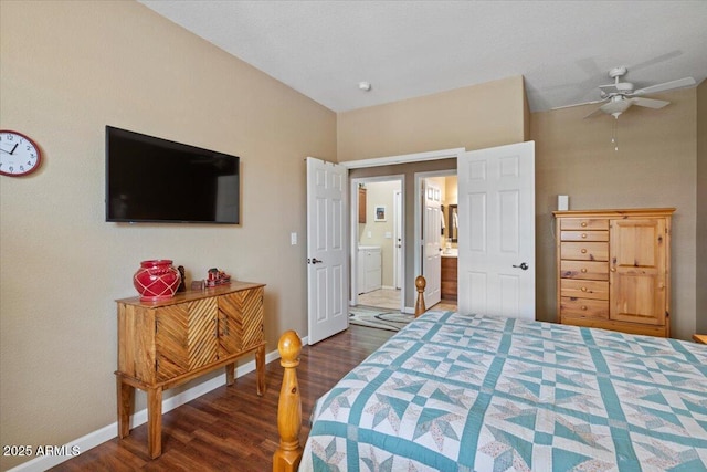 11025 E Nichols Ave, Mesa, AZ 85209 - bedroom with dark wood finished floors, baseboards, ensuite bathroom, and washer / dryer