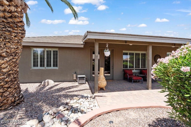 11025 E Nichols Ave, Mesa, AZ 85209 - back of house with stucco siding and a patio