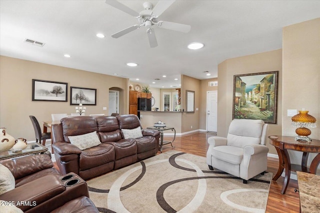 11025 E Nichols Ave, Mesa, AZ 85209 - living area featuring light wood finished floors, baseboards, recessed lighting, and ceiling fan