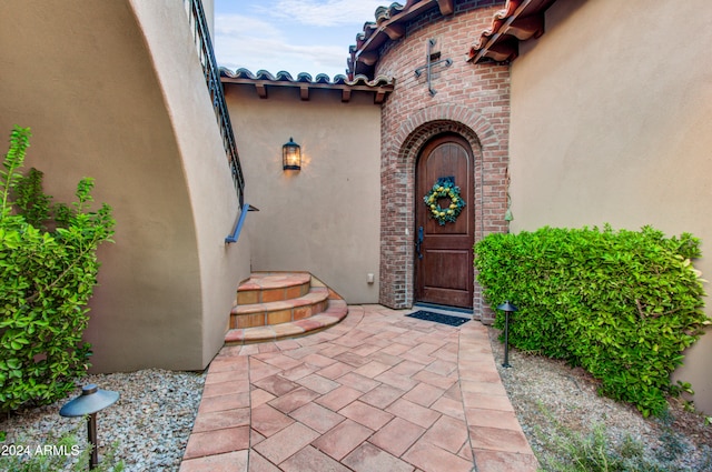 3129 S Honeysuckle Ct, Gold Canyon, AZ 85118 - doorway to property with brick siding and stucco siding