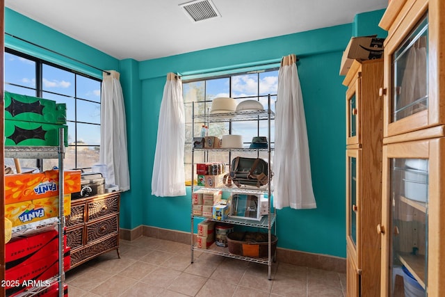 misc room featuring tile patterned floors