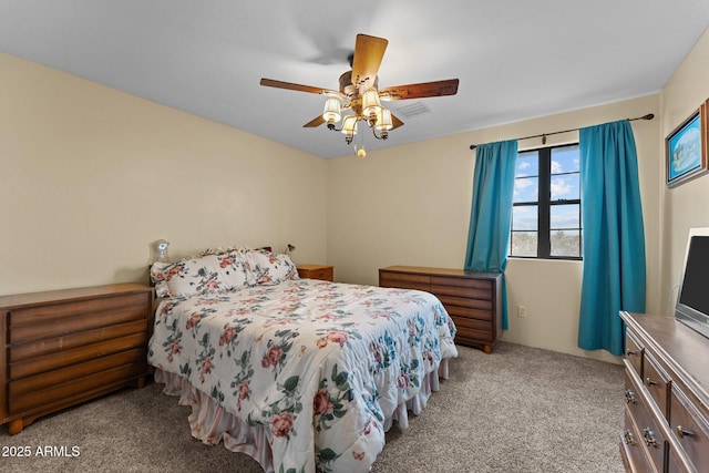 bedroom with light carpet and ceiling fan