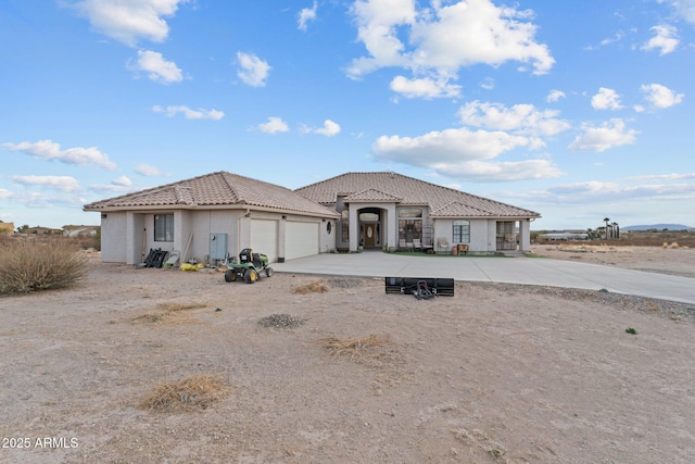 view of front of home with a garage