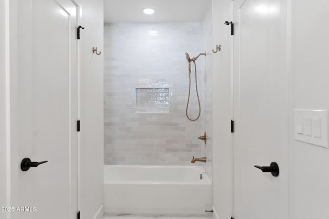 bathroom with washtub / shower combination