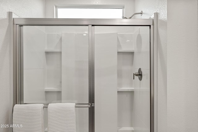 17738 W Onyx Ave, Waddell, AZ 85355 - full bath with a textured wall and a shower stall