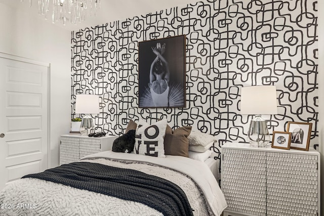 17738 W Onyx Ave, Waddell, AZ 85355 - bedroom featuring a chandelier