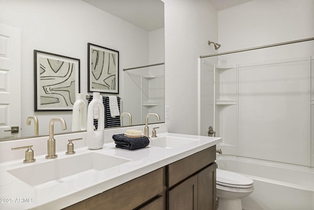 17738 W Onyx Ave, Waddell, AZ 85355 - bathroom with toilet, washtub / shower combination, double vanity, and a textured wall