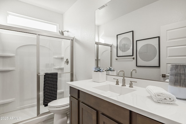 17738 W Onyx Ave, Waddell, AZ 85355 - bathroom with a stall shower, toilet, and vanity
