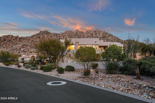 view of front of property with a mountain view