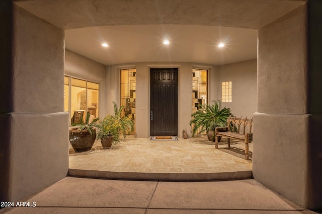 doorway to property with a patio