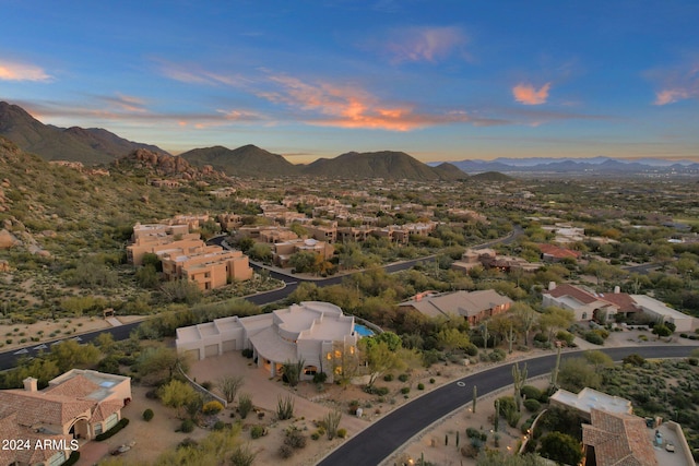 aerial view at dusk with a mountain view