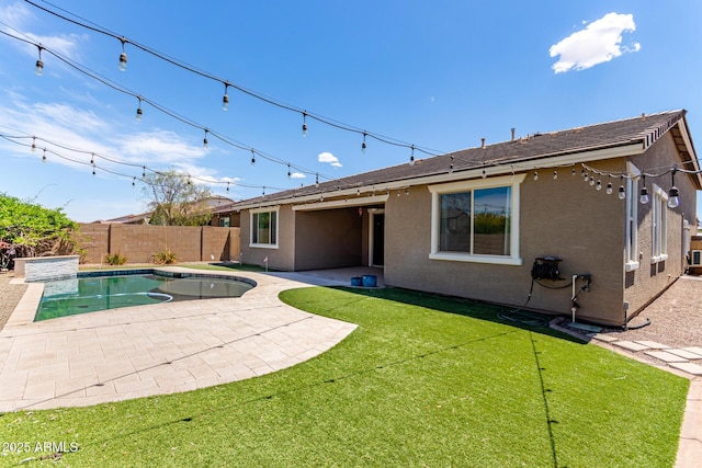 view of pool with a patio, a fenced backyard, a lawn, and a fenced in pool