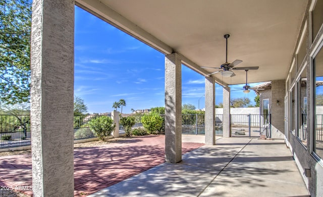 view of patio featuring a fenced backyard and a ceiling fan