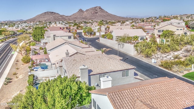 drone / aerial view with a residential view and a mountain view