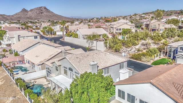 bird's eye view with a mountain view and a residential view