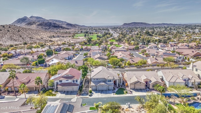 drone / aerial view with a mountain view and a residential view