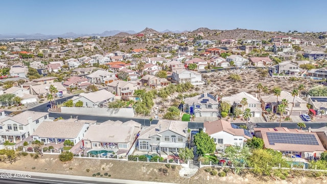 aerial view featuring a mountain view and a residential view