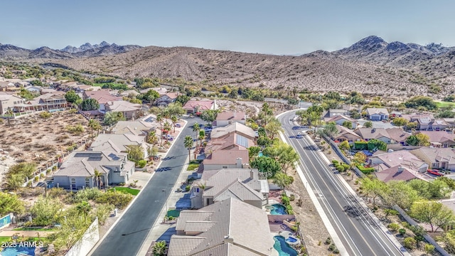 aerial view with a mountain view and a residential view