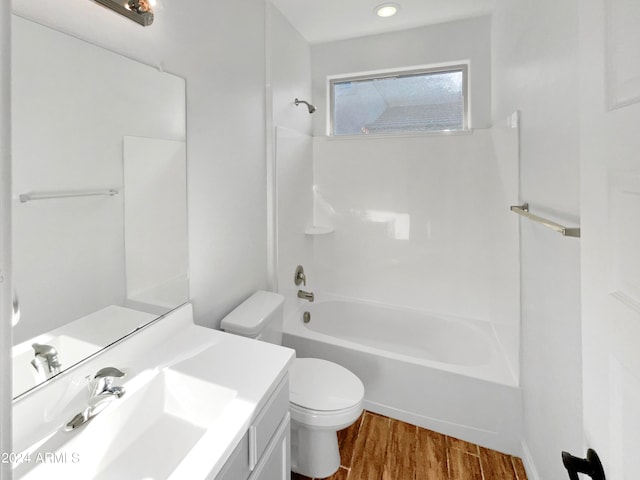 full bathroom with vanity, toilet, bathtub / shower combination, and wood-type flooring