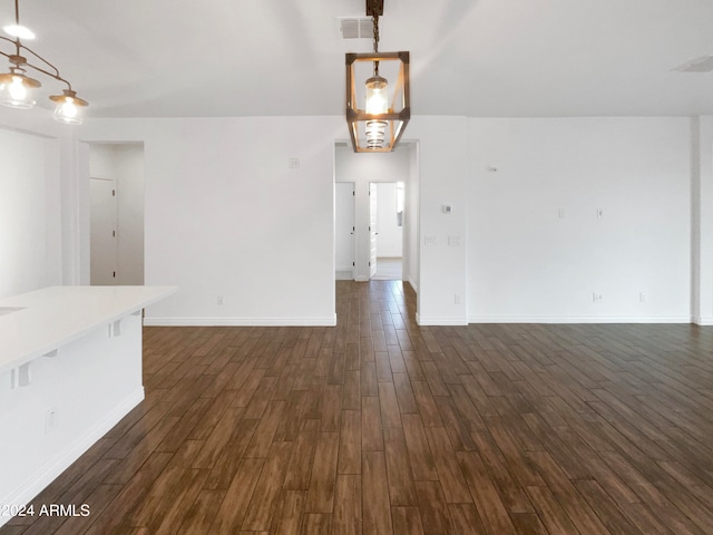 spare room featuring dark hardwood / wood-style floors