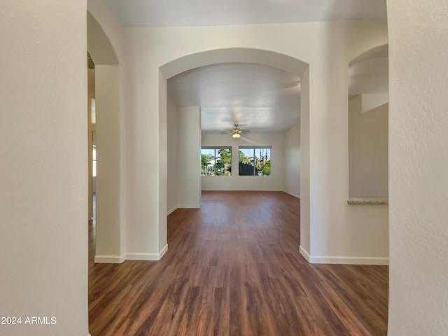 corridor with dark wood-type flooring