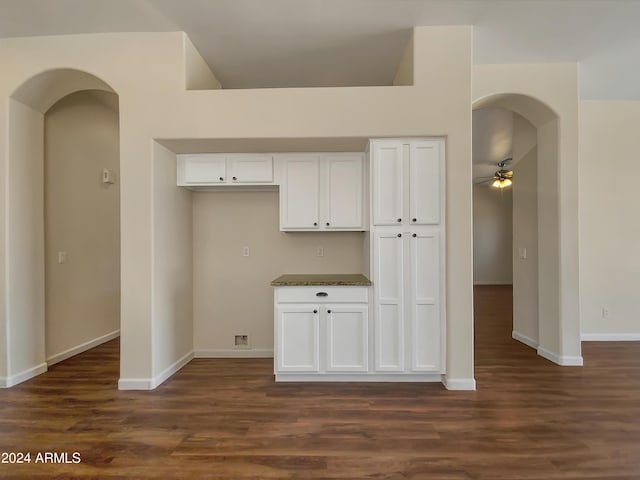 kitchen featuring ceiling fan, white cabinets, and dark hardwood / wood-style floors