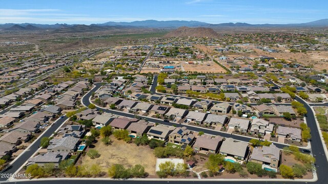 25449 N 102nd Dr, Peoria, AZ 85383 - aerial view of property's location with a mountain backdrop and nearby suburban area