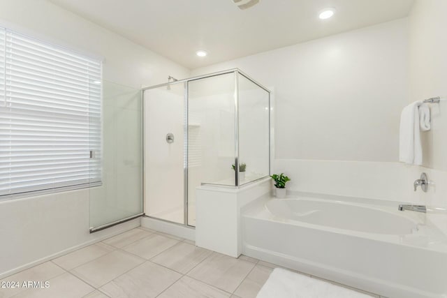 bathroom with plus walk in shower and tile patterned floors