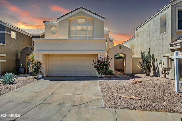 view of front of property featuring a garage