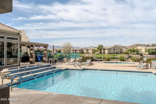 view of pool featuring a patio