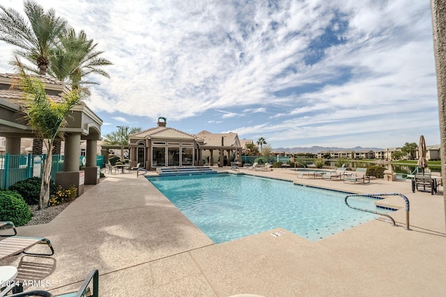 view of pool featuring a gazebo and a patio