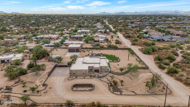 drone / aerial view featuring a mountain view