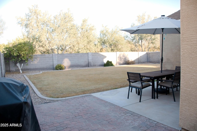 view of patio featuring a grill