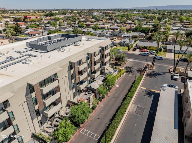 birds eye view of property featuring a mountain view
