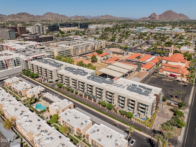 birds eye view of property featuring a mountain view