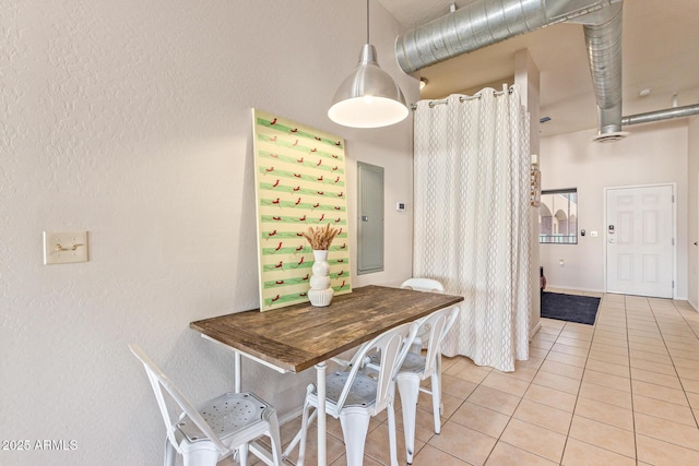 424 S 2nd St Unit 203, Phoenix, AZ 85004 - dining space featuring electric panel, light tile patterned floors, and a textured wall