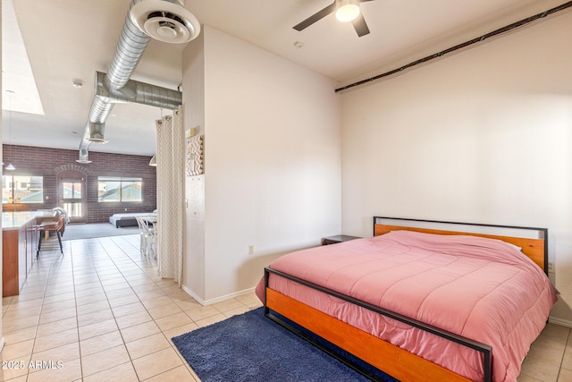 424 S 2nd St Unit 203, Phoenix, AZ 85004 - bedroom with light tile patterned floors and brick wall