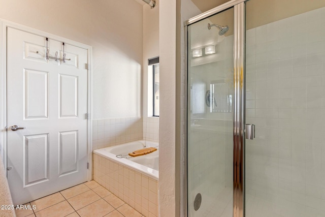 424 S 2nd St Unit 203, Phoenix, AZ 85004 - full bathroom featuring tile patterned flooring, a shower stall, and a garden tub