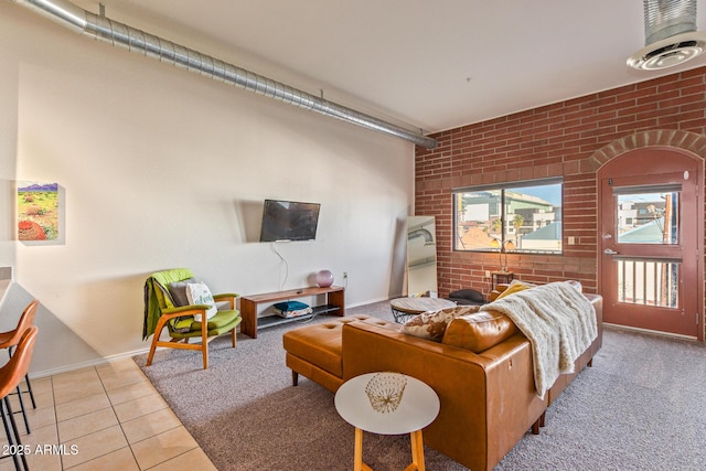 424 S 2nd St Unit 203, Phoenix, AZ 85004 - living area with brick wall and tile patterned floors