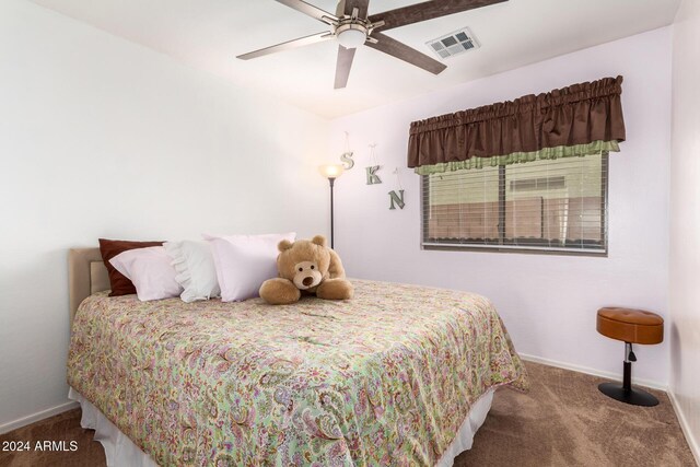 bedroom featuring carpet and ceiling fan