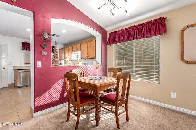 view of carpeted dining area