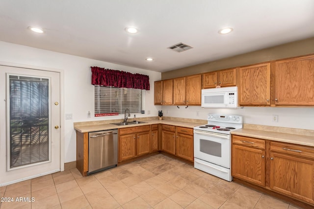 kitchen with sink and white appliances