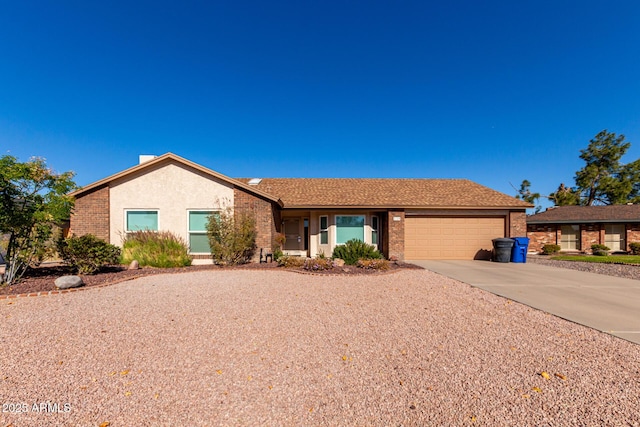 single story home featuring a garage