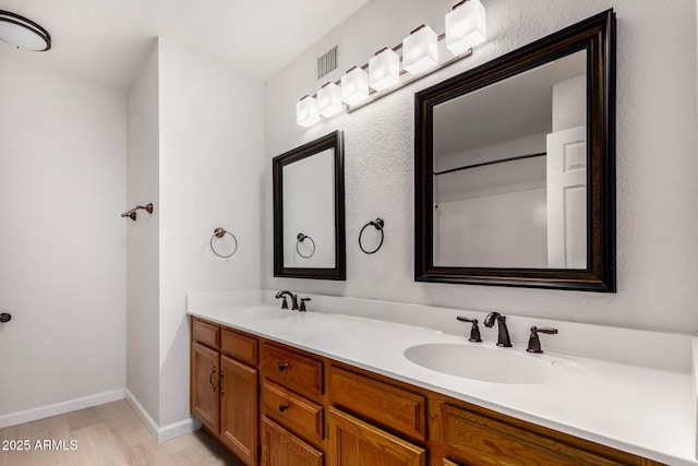 bathroom featuring vanity