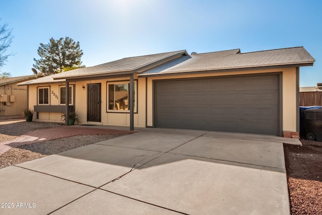 ranch-style home with a garage