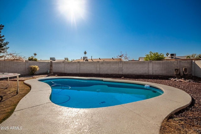 view of pool featuring a trampoline