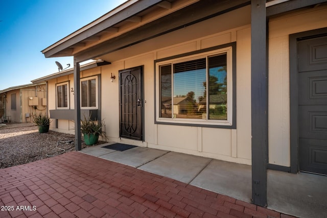 doorway to property with a patio