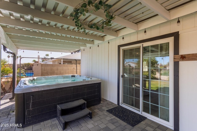 view of patio featuring a hot tub