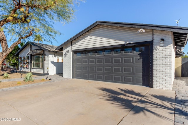 single story home with a garage