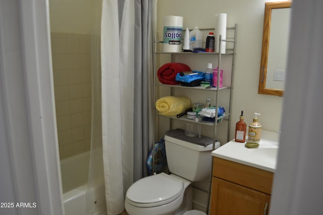 full bathroom featuring shower / bath combo with shower curtain, toilet, and vanity